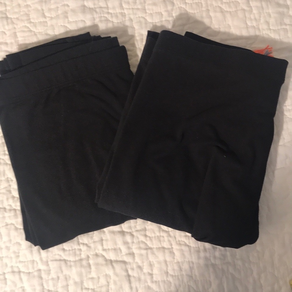 2 pairs of black leggings size small